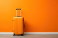 Modern Carry-On Suitcase Against an Orange Backdrop Ai Generated Illustration