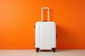 Modern Carry-On Suitcase Against an Orange Backdrop Ai Generated Illustration