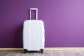 Modern Carry-On Suitcase Against Purple Backdrop Ai Generated Illustration