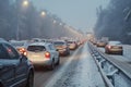 Modern cars are stuck in a traffic jam on a highway in winter Royalty Free Stock Photo