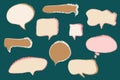 Modern cartoon speech bubbles in different shapes and natural beige colors, abstract hand-drawn conversational doodle art Royalty Free Stock Photo