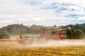 Modern case combine harvester cutting crops Royalty Free Stock Photo
