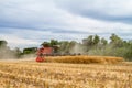 Modern case combine harvester cutting crops Royalty Free Stock Photo