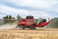 Modern case combine harvester cutting crops Royalty Free Stock Photo