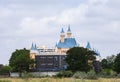 Modern Castle Like Building with Cloudy Sky