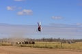 Modern cattle mustering with helicopter and motorbike.