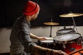 Modern caucasian man play on drums