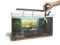 modern cconcept of labor slavery, social exclusion, working office in the aquarium with hand holding 3d genereted person
