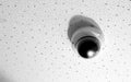 Modern CCTV security camera on white ceiling Royalty Free Stock Photo