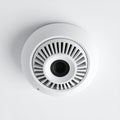 Modern CCTV Surveillance Camera on a White Ceiling Royalty Free Stock Photo