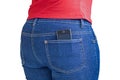 Modern cellphone sticking out of a jeans pocket Royalty Free Stock Photo