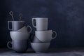 Modern ceramic dinnerware. Black ang grey cups, bowls