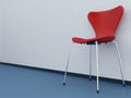 Modern Chair to face a blank white wall Royalty Free Stock Photo