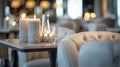 The modern chairs are dd with luxurious white fabric and topped with delicate candle holders adding a touch of opulence