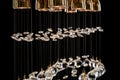 Modern Chandelier for interior of the living room. a bunch of crystal balls isolated on black background. Royalty Free Stock Photo