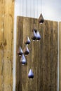 Modern chandelier, many small pendant lights in the form of drops of wood, eco style interior design Royalty Free Stock Photo