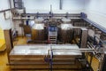 Modern cheese factory, stainless steel milk processing tanks