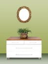 Modern chest of drawers and gilded Frame on wall Royalty Free Stock Photo