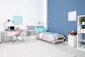 Modern child room interior with comfortable bed Royalty Free Stock Photo