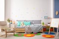Modern child room interior with comfortable bed Royalty Free Stock Photo