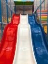 Modern children playground indoor with slide