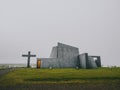 Modern church, concrete construction, with a large cross, new parish church, Bloendus,