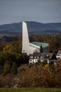 Modern church with steeple in the forest Royalty Free Stock Photo