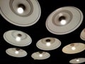 Modern circle light lamp or multiple chandeliers hang from the ceiling to provide a warm glow for interior on vintage tone Royalty Free Stock Photo