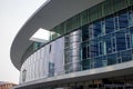 Modern circular building with windows in the Gae Aulenti square. Royalty Free Stock Photo