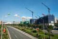 Modern city with highway traffic and building under construction. Hanoi city, Thang Long highway Royalty Free Stock Photo