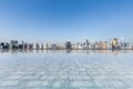 Modern city skyline with empty square floor Royalty Free Stock Photo