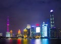 Modern city skyscrapers of Shanghai skyline at night with reflection of beautiful ligth in Huangpu river view from Royalty Free Stock Photo