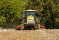 Modern claas tractor cultivating field Royalty Free Stock Photo