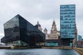 Modern and classic architecture at the Liverpool Docks, Port of Liverpool, late on a cloudy afternoon