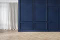 Modern classic blue interior blank wall with moldings, curtains, hiden door and wood floor. Royalty Free Stock Photo