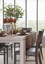 Modern classic dining set on table with natural lighting