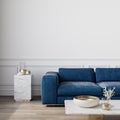 Modern classic white interior with blue sofa and decor. Royalty Free Stock Photo