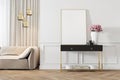 Modern classic white interior with dresser, console, sofa, furniture, lamp, flower, gifts, frame, picture. Royalty Free Stock Photo