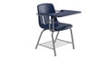 Modern classroom desk chair with attached writing surface for students Royalty Free Stock Photo