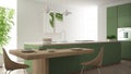 Modern clean contemporary green kitchen, island and wooden dining table with chairs, bamboo and potted plants, big window and