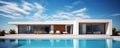 Modern clean minimalistic house with swimming pool and blue sky in summer day. Vacation best property Royalty Free Stock Photo