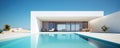 Modern clean minimalistic house with swimming pool and blue sky in summer day. Vacation best property Royalty Free Stock Photo