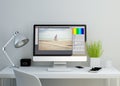 modern clean workspace with photo editor on screen