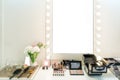 Modern closet room with make-up vanity table, mirror and cosmetics product in flat style house. Royalty Free Stock Photo