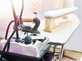 Modern clothes iron and ironing board Royalty Free Stock Photo