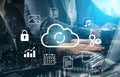 Modern Cloud Computing Concept with Data Management and Syncing Icons over a Business Person Working on Laptop in an Royalty Free Stock Photo