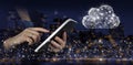 Modern cloud technology. Integrated digital web. Hand touch white tablet with digital hologram cloud sign on city dark blurred Royalty Free Stock Photo