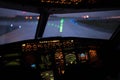 Modern cockpit a commercial airliner airplane during takeoff Royalty Free Stock Photo