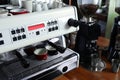 Modern coffee machine on bar counter in cafe Royalty Free Stock Photo
