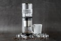Modern Cold brew drip tower coffee maker on dark stone background Royalty Free Stock Photo